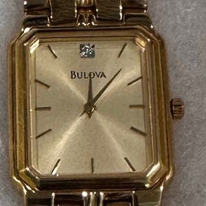Men’s gold colored Bulava watch